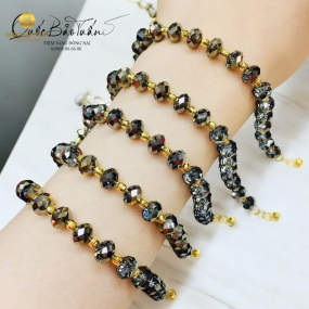 Chuỗi phale nâu mix charm vàng