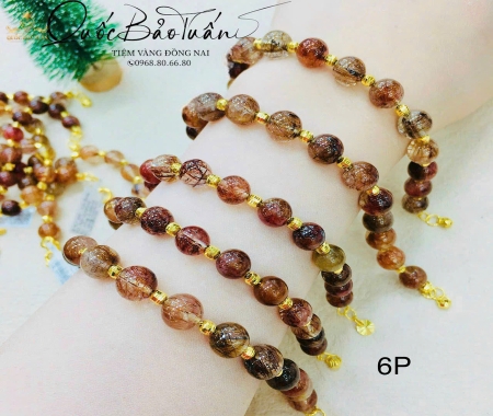 Chuỗi thạch anh nâu mix charm vàng